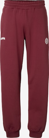 Tapered Pantaloni di Unfair Athletics in rosso: frontale