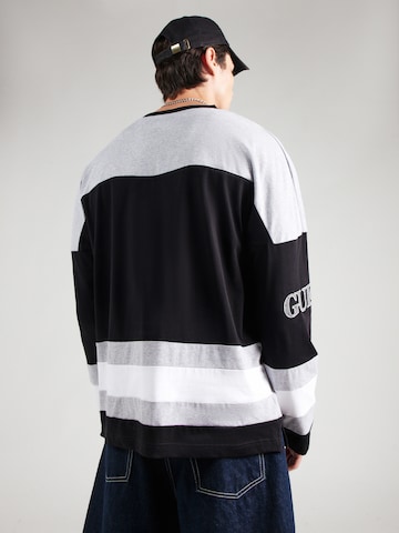 juoda GUESS JEANS Marškinėliai 'HOCKEY'