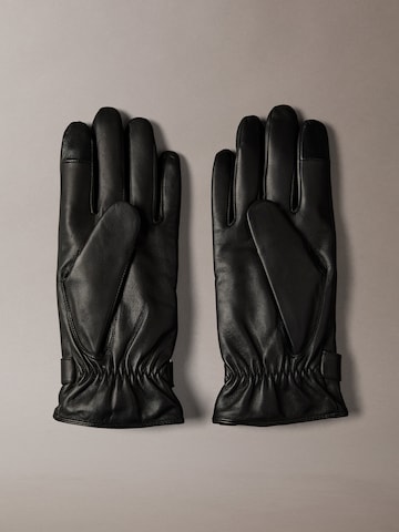 Mezzoguanti di Calvin Klein in nero