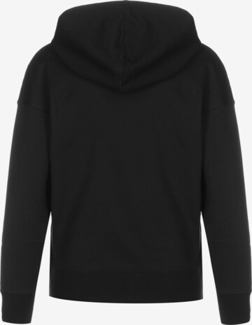 PUMA Sweatshirt 'SWxP' in Zwart