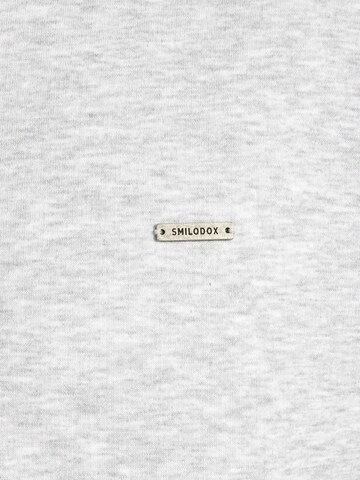 Veste de survêtement Smilodox en gris