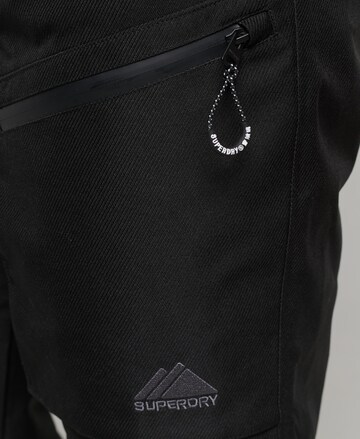 Coupe slim Pantalon outdoor 'Freeride' Superdry en noir