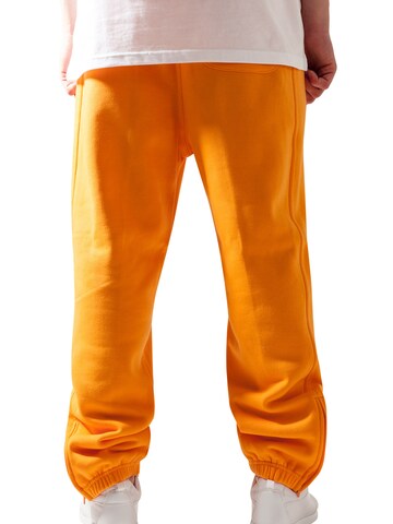 Urban Classics Tapered Trousers in Orange