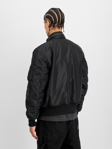ALPHA INDUSTRIES Between-Season Jacket 'Engine' in Black: back