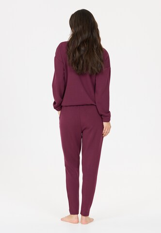 Athlecia Tapered Sports trousers 'Jacey' in Red
