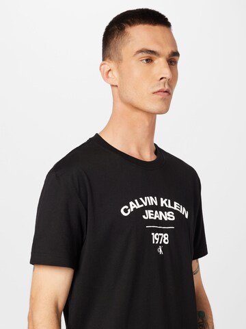 Calvin Klein Tričko 'Varsity' – černá