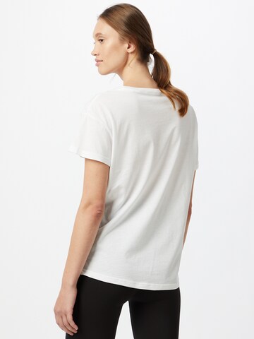 T-shirt fonctionnel PUMA en blanc