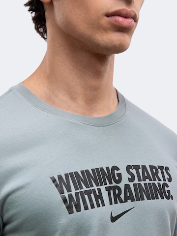 NIKE Funkcionális felső 'WINNING' - szürke