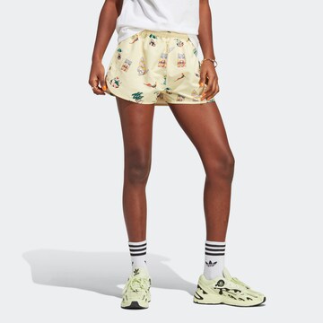 ADIDAS ORIGINALS Loose fit Pants in Yellow: front