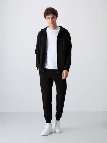 Tommy Life Sweatsuit in Black: front