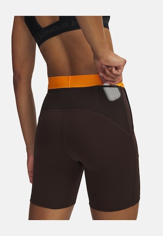 UNDER ARMOUR Skinny Sports trousers in Brown