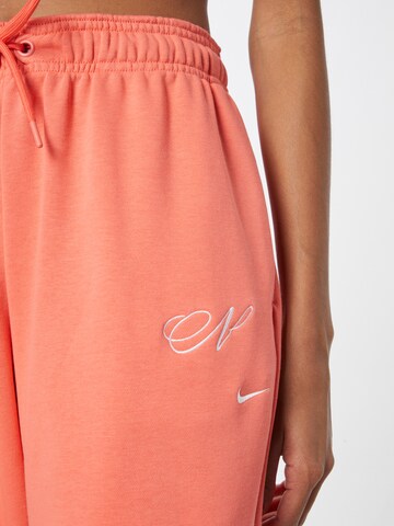 Nike Sportswear Zúžený Kalhoty – oranžová