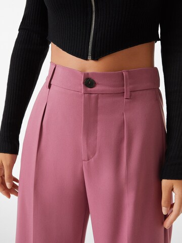 Bershka Wide leg Pleat-front trousers in Pink