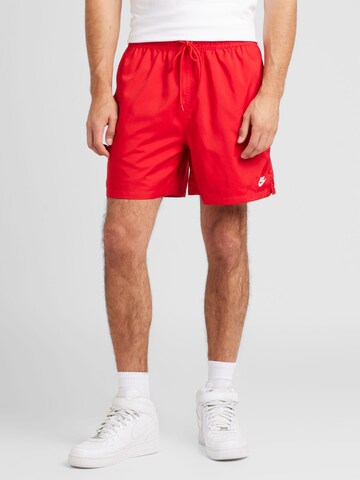 Nike Sportswear Loosefit Kalhoty 'CLUB' – červená: přední strana