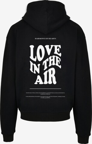 Sweat-shirt 'Love In The Air' Merchcode en noir