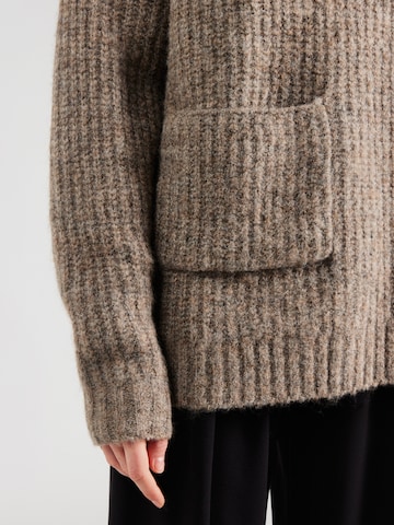 smėlio VERSTIQUE Megztinis be užsegimo