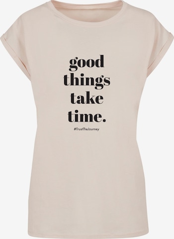 Merchcode T-Shirt 'Good Things Take Time' in Beige: predná strana