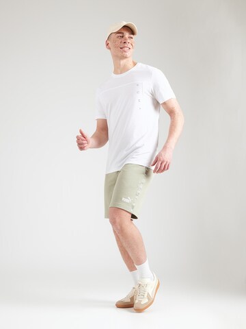 PUMAregular Sportske hlače 'ESS' - zelena boja