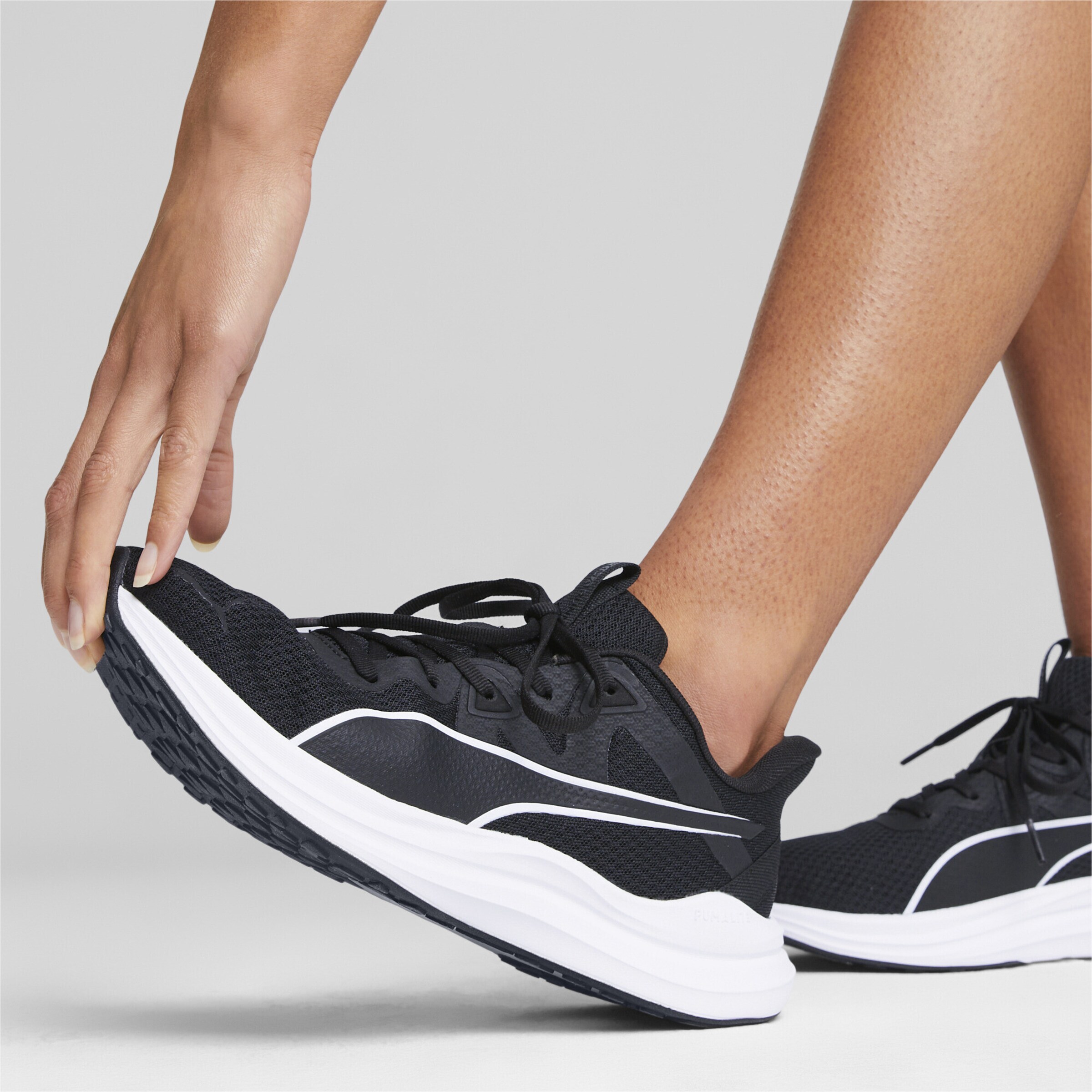 PUMA Running Shoes Reflect Lite in Black ABOUT YOU