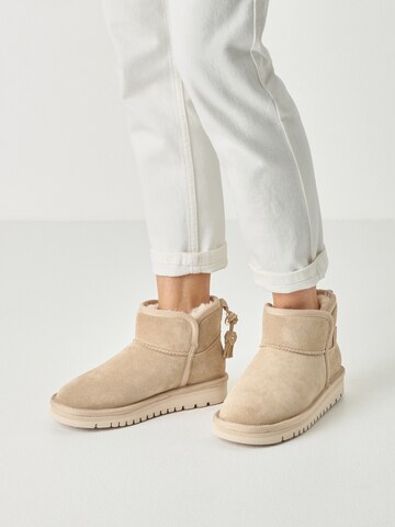 Tamaris - Botas em castanho