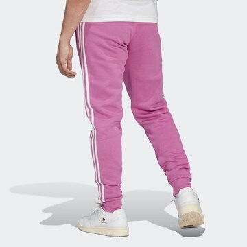 Effilé Pantalon ADIDAS ORIGINALS en violet
