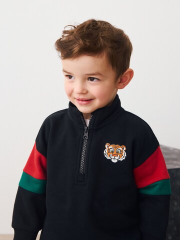 Next - Ropa para correr en negro