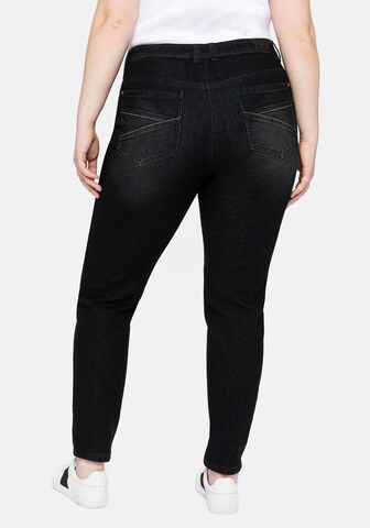 Coupe slim Jean SHEEGO en noir