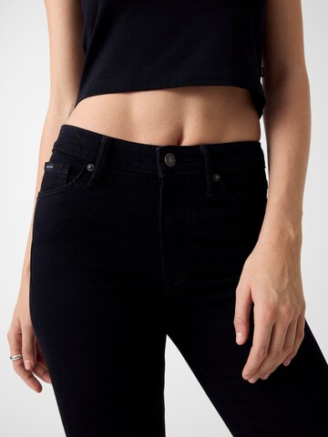 Slimfit Jeans 'G05' di GUESS JEANS in nero