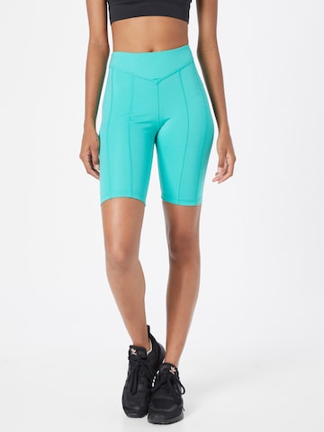 Skinny Pantalon de sport Reebok en bleu : devant