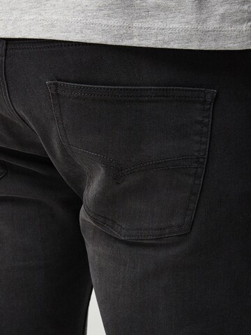 Slimfit Jeans di Next in nero