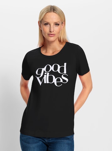 Tricou de la heine pe negru: față