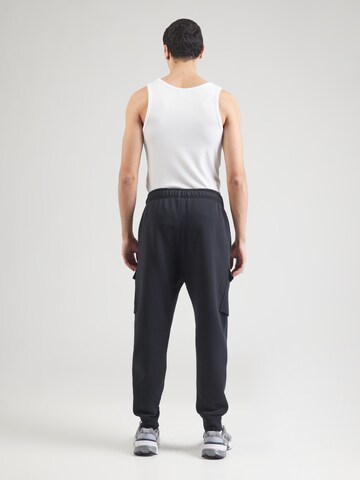 Nike Sportswear Zwężany krój Bojówki 'AIR' w kolorze czarny