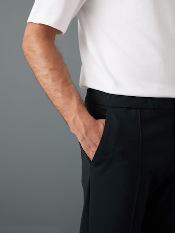 Next Slimfit Spodnie w kant w kolorze niebieski