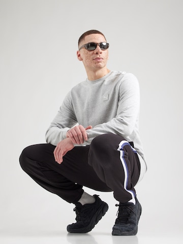 pilka PUMA Sportinio tipo megztinis 'Essentials'