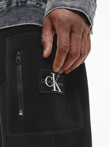 Calvin Klein Jeans Voľný strih Nohavice - Čierna