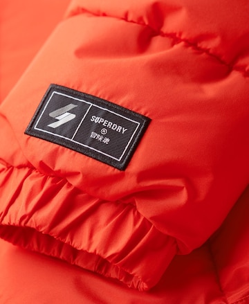 Superdry Zimná bunda - oranžová