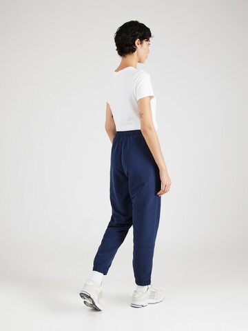 Hummel - Tapered Pantalón deportivo en azul