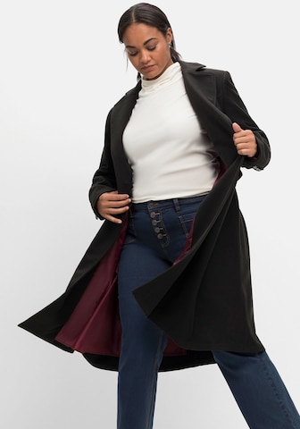 SHEEGO Between-Seasons Coat in Black: front