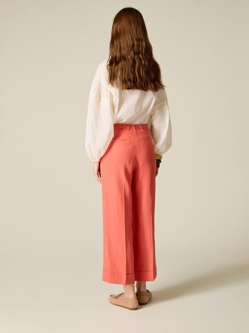 oltre - Tapered Pantalón en naranja