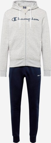 Champion Authentic Athletic Apparel Tracksuit in Blue: front
