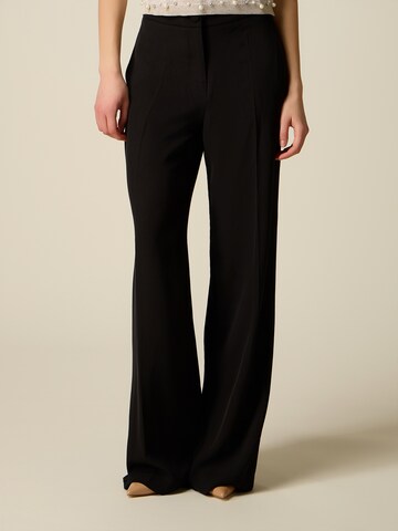 oltre Baggy Trousers in Black