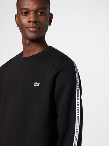 LACOSTE Sweatshirt i sort