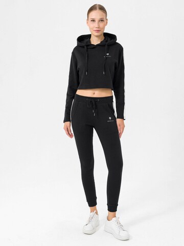 Skinny Pantalon de sport 'Naka' MOROTAI en noir