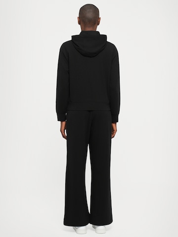 Tuta da jogging di EA7 Emporio Armani in nero