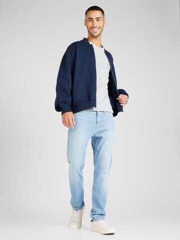 Coupe slim Jean 'SCANTON' Tommy Jeans en bleu : devant