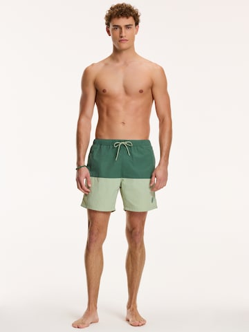 Shiwi Kratke kopalne hlače ' NICK' | zelena barva