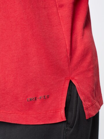 T-Shirt fonctionnel Jordan en rouge