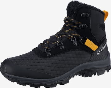 JACK WOLFSKIN Boots in Black: front