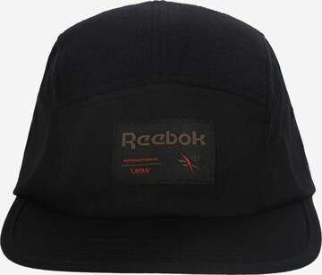 Reebok - Gorra en negro: frente
