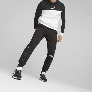 PUMA - Tapered Pantalón deportivo en negro: frente